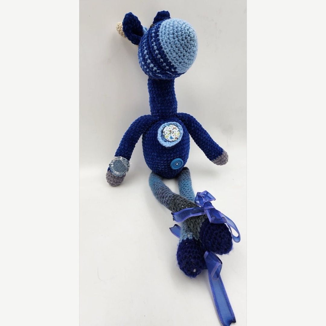 Cuddles the crochet Giraffe